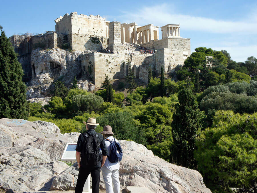 Credit: Valerijs / Adobe Stock Reading an inscription across the Acropolis Hill