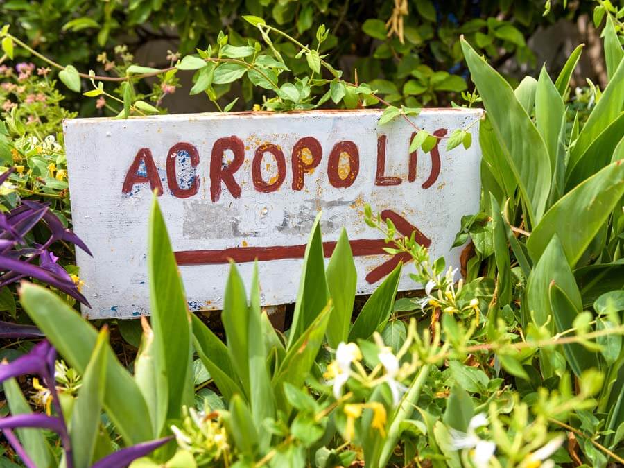 Credit: Scaliger / bigstockphoto Handmade signpost in Anafiotika