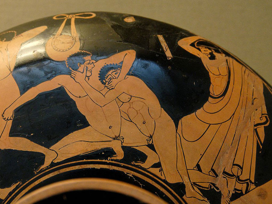 Credit: Marie-Lan Nguyen / Wikimedia Commons Pankration scene: the pankriatiast on the right tries to gouge his opponent's eye; the umpire is about to strike him for this foul. Detail from an Attic red-figure kylix c. 490-480 BC
