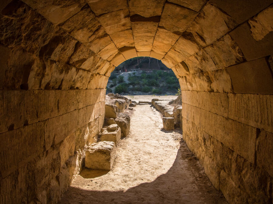 Credit: Haris Andronos / Adobe Stock Entrance tunnel from where the athletes entered to the stadium of Nemea